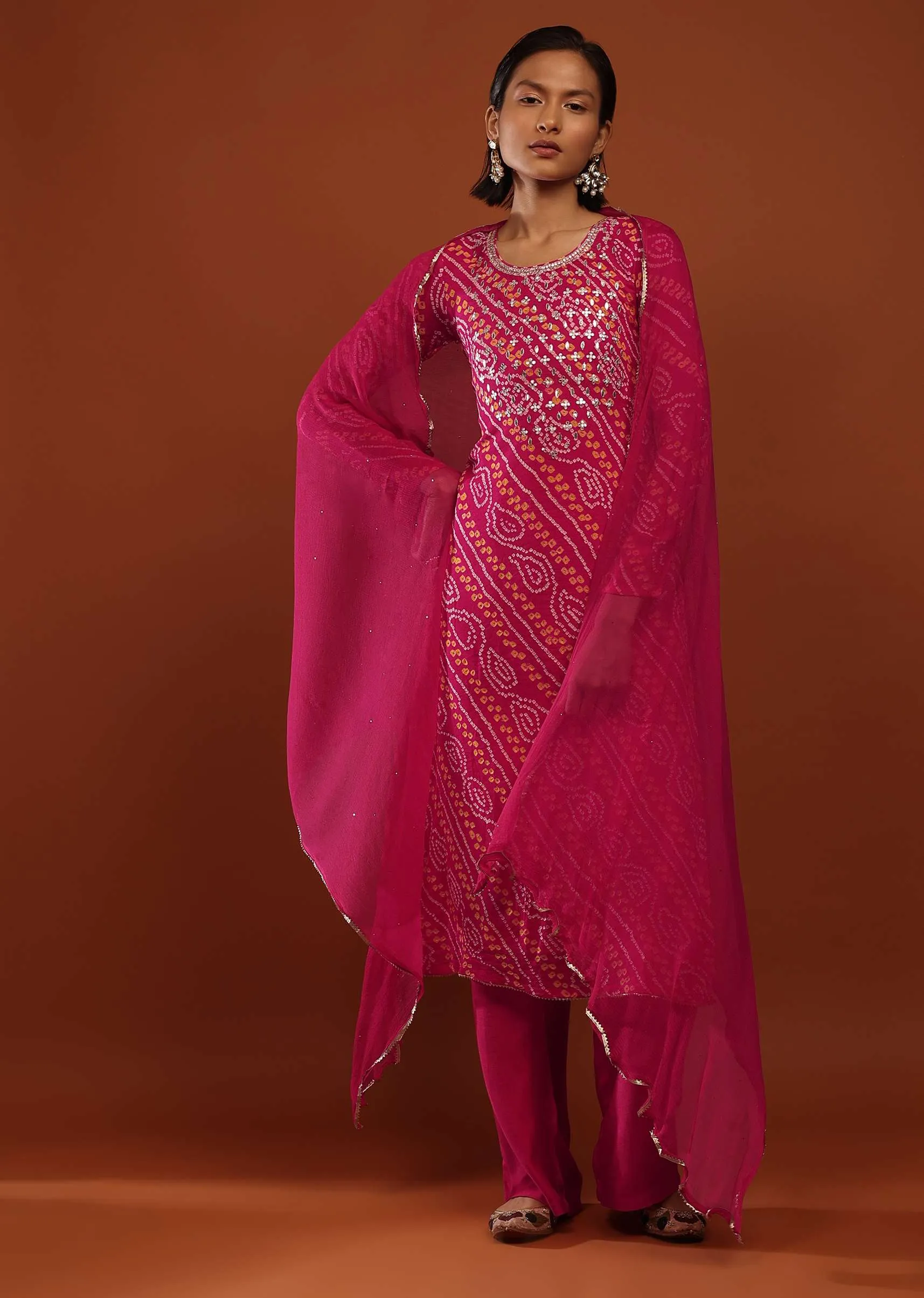 Magenta Pink Suit In Georgette With Bandhani Print And Gotta Embroidered Yoke